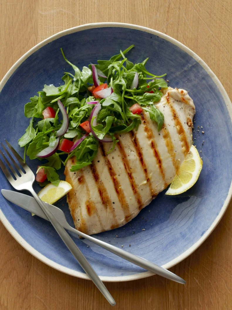 Bobby Flay's Grilled Chicken Paillard with Lemon and Black Pepper and Arugula-Tomato Salad