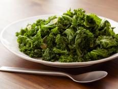 Try Bobby Flay's simple Sauteed Kale recipe from Food Network. For a pop of flavor, add a splash of red wine vinegar at the end.