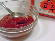 Gochujang (a spicy, slightly sweet, beautiful dark red fermented chili paste) has been a staple ingredient in Korean households for hundreds of years. It's used as an ingredient in stews and sauces, or simply as a dip for a snack.