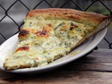 Eating at Artichoke's is a sloppy but delicious affair. The pizzas are easily an inch thick, and that's not because of the crust. Try a slice piled high with artichokes and spinach, their namesake dish. It may seem a little pricey for pizza, but one slice satisfies even the biggest appetites.