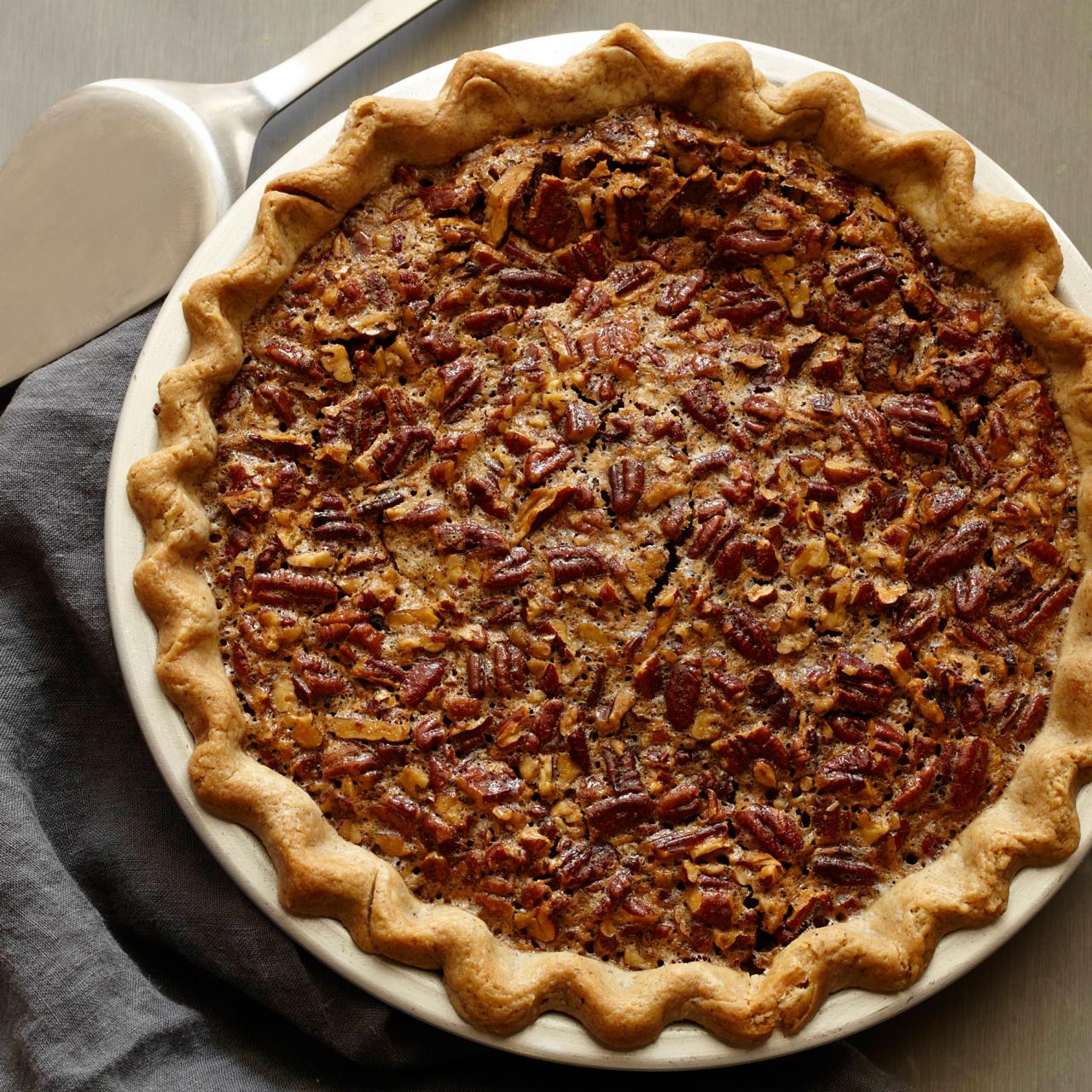 https://food.fnr.sndimg.com/content/dam/images/food/fullset/2012/9/5/0/FN-Kitchens_Pecan-Pie-Recipe_s4x3.jpg.rend.hgtvcom.1280.1280.suffix/1382541789932.jpeg