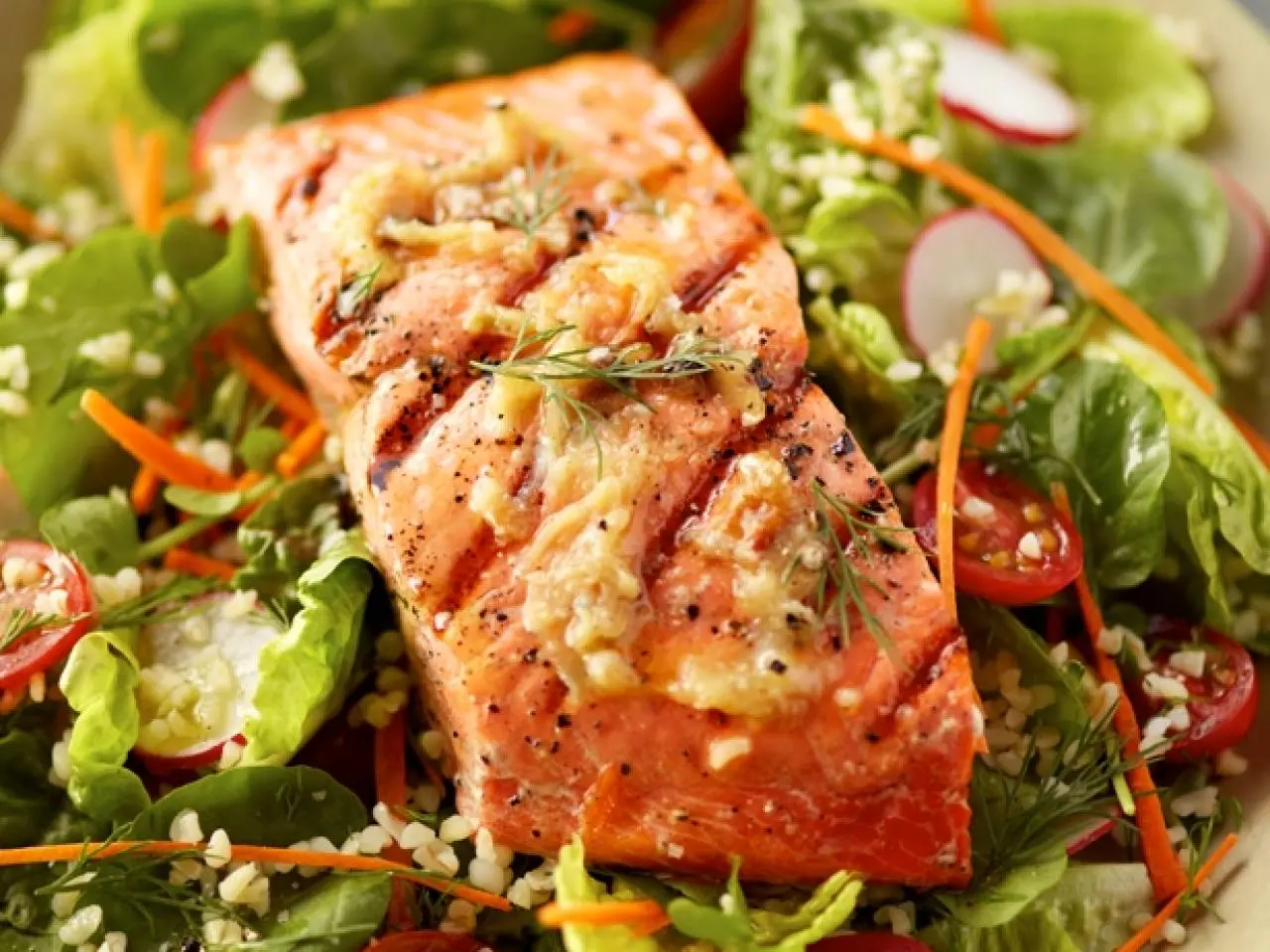 https://food.fnr.sndimg.com/content/dam/images/food/fullset/2013/1/25/0/RX-ALASKA-SEAFOOD_garlic-grilled-alaska-salmon-salad_s3x4.jpg.rend.hgtvcom.1280.960.suffix/1371613666832.webp