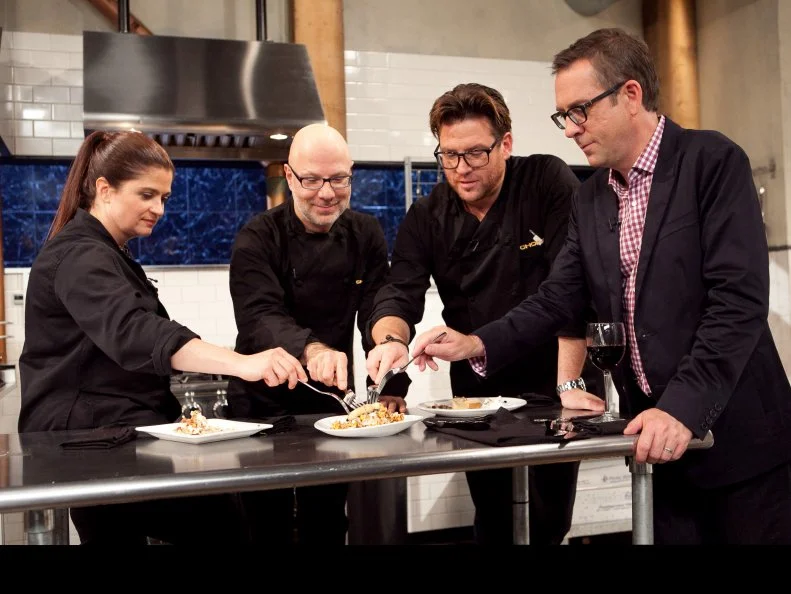 Host Ted Allen and After Hours Chefs Alex Guarnaschelli, Ron Ben-Israel and Scott Conant discuss and taste their dishes the were made with: popcorn, sour cream, funnel cake and blue snow cones, as seen on Food Network's Chopped: After Hours.