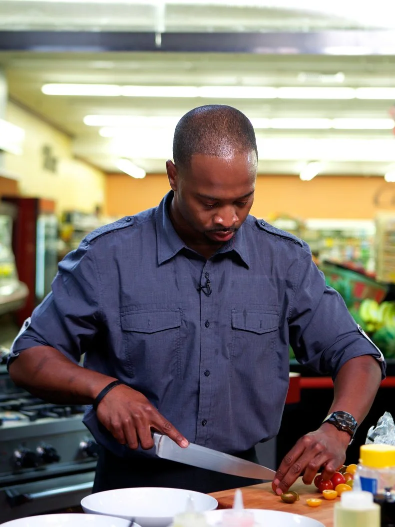 Chefs Stanley Hagerman during the cooking part of Game 1, Out of Stock, Spaghetti and Meatballs, No pasta or ground beef, 30 min time limit, as seen on Food Network's Guy's Grocery Games, Season 1.