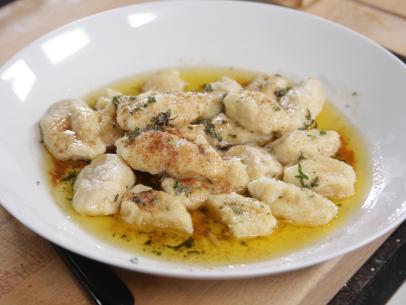Mascarpone and lemon gnocchi with butter thyme Sauce cooked by Giada De Laurentiis and Ina Garten as seen on Food Network’s The Barefoot Contessa, Season 9.