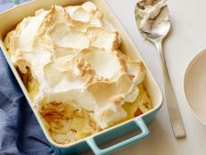 In her take on the classic Southern dessert, Trisha Yearwood layers a quick homemade vanilla pudding with vanilla wafers and sliced bananas, all topped with toasted meringue. The best part? You can have this 5-star Banana Pudding on the table in less than an hour.