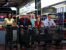 Host Guy Fieri with chefs Jessica Swift, Lenny McNad, Cristina Topham, and Greg Akahoshi during the start of the shopping part of Game 1, Out of Stock, Gourmet Salad, All Leafy Greens and Lettuce removed, 30 minute time limit, as seen on Food Network's Guy's Grocery Games, Season 1.
