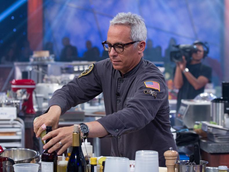 Iron Chef, Geoffrey Zakarian completes in studio kitchen during the Thanksgiving battle, as seen on Food Network’s Iron Chef America.