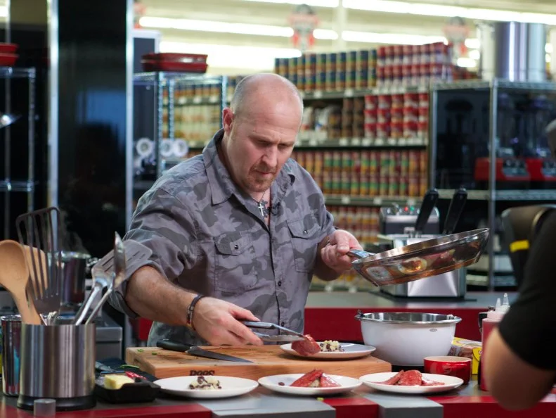 Chef Keith Obarski during the cooking part of Game 1, Can Can, Surf and Turf, as seen on Food Network's Guy's Grocery Games, Season 1.