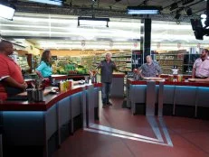 Host Guy Fieri with chefs Shawn Davis, Dayna McLeod, Keith Obarski, and Gio Ketchedjian, during the introduction of Game 1, Can Can, Surf and Turf, as seen on Food Network's Guy's Grocery Games, Season 1.