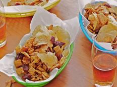 Whether you're hosting a rowdy football-watching crowd or headed to a game day party, a snack mix is a great make-ahead option for guests.