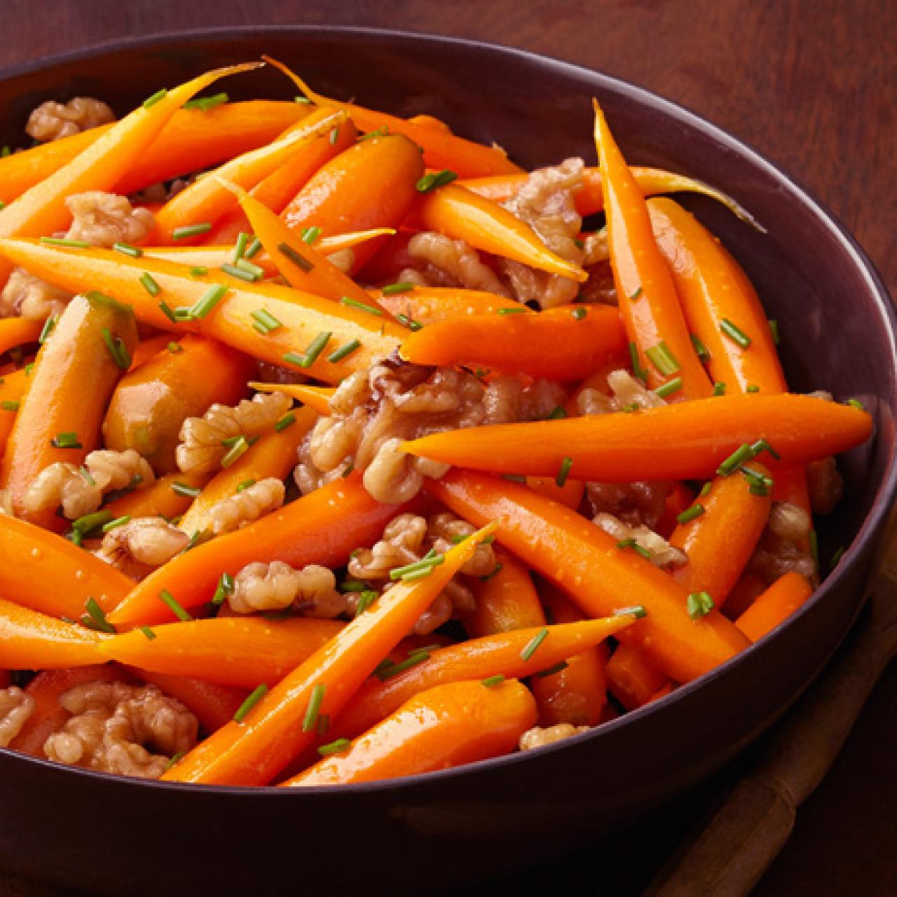 https://food.fnr.sndimg.com/content/dam/images/food/fullset/2013/10/4/3/FNM_110113-Carrots-With-Walnuts-Recipe_s4x3.jpg.rend.hgtvcom.1280.1280.suffix/1383788732592.jpeg