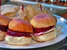 Visit Gatsby's Diner for Old World European comfort food and unique vegetarian dishes. The pastrami-marinated beet sliders with green goddess dressing and homemade chips were meaty and tender according to Guy. Meat lovers should try the flavorful beef rouladen or the brined pork chops.