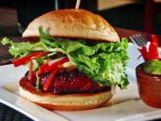 <p>This Las Vegas burger joint is serving big American burgers with an Asian twist. Guy visited Bachi for its oxtail chili cheese fries and its signature Bachi Burger made with beef, pork and shrimp. Its unique flavor combos blew Guy away on Triple D, with him quipping: "This is BurgerBomb.com."</p>