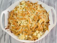 Try Rachael Ray's recipe for Cauliflower Mac N Cheese. The addition of steamed cauliflower ups the healthful factor without interfering with the trademark flavor.