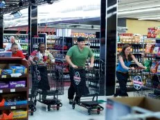 Host Guy Fieri with the chefs Chris Tzorin, Celeste Gill, Eric Tonips, and Jill Sharpe during the start of Game 1, 5 Ingredients Or Less, International Dish, 30 minute time limit, as seen on Food Network's Guy's Grocery Games, Season 1.