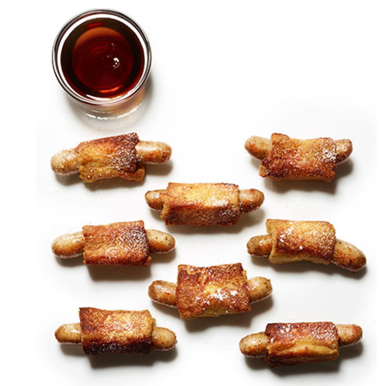 https://food.fnr.sndimg.com/content/dam/images/food/fullset/2013/11/14/1/fnm_120113-french-toast-pigs-in-blankets-recipe_s4x3.jpg.rend.hgtvcom.1280.1280.suffix/1385047416062.jpeg