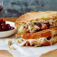 LEFTOVER THANKSGIVING PANINI
Ree Drummond
The Pioneer Woman/Turkey Day Leftovers
Food Network
Dijon Mustard, Sourdough Sandwich Bread, Swiss Cheese, Leftover Roasted Thanksgiving
Turkey, Cranberry Sauce, Leftover Dressing, Leftover Giblet Gravy, Butter