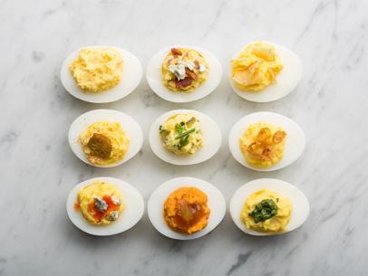 https://food.fnr.sndimg.com/content/dam/images/food/fullset/2013/11/26/2/FN_Deviled-Eggs-Group_s4x3.jpg.rend.hgtvcom.406.305.suffix/1386173365767.jpeg