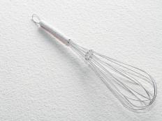 Wire whisk on flour