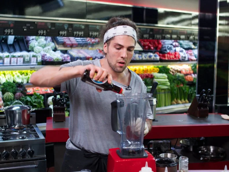 Chef Samuel Monsour during the cooking part of Game 2, Grocery List, Mexican Fiesta, Ad Sale integration Kikkoman Soy Sauce, must have Kikkoman Soy Sauce, 30 minute time limit, as seen on Food Network's Guy's Grocery Games, Season 1.