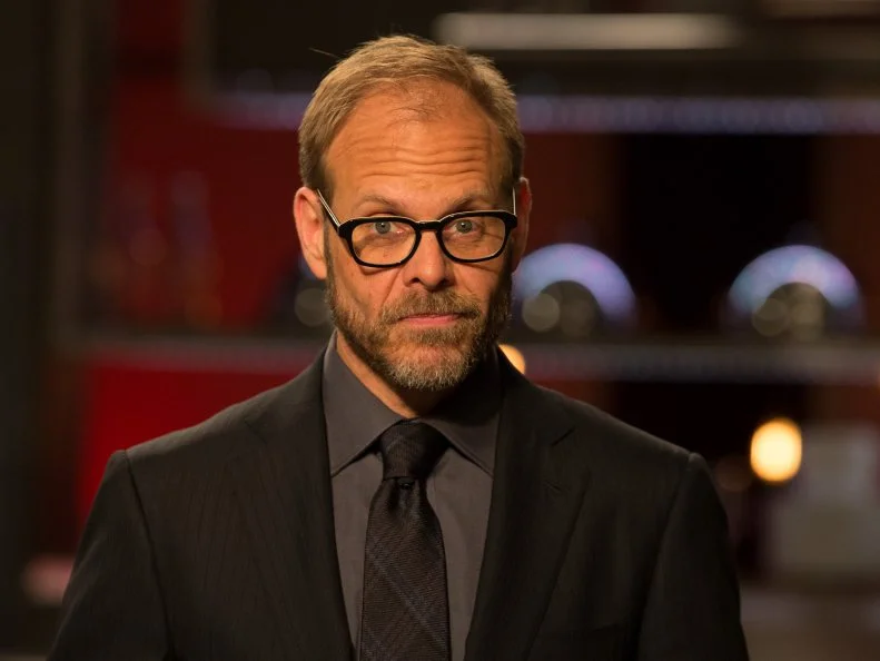 Host Alton Brown, as seen on Food Network's Cutthroat Kitchen, Season 1.