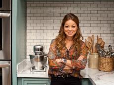 Host Marcela Valladolid, poses for a portrait on the set of Food Network's The Kitchen, Season 1.