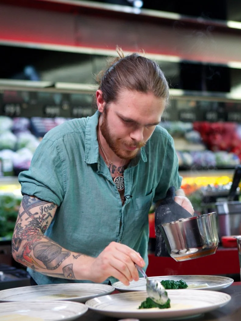 Chef Phillip Franklin Lee during the cooking part of Game 3, 5 Ingredients Or Less, Upscale Chicken Dinner, 35 min cooking time, as seen on Food Network's Guy's Grocery Games, Season 1.