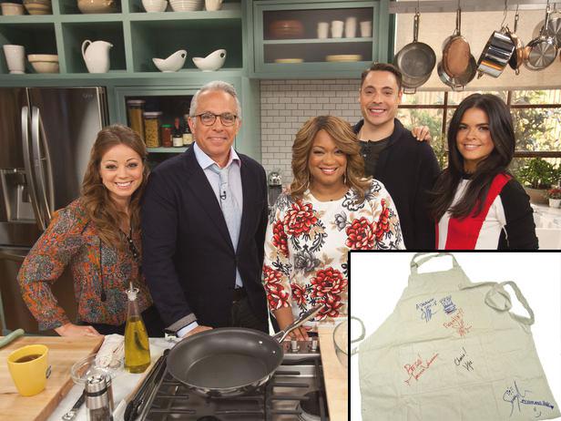 Enter for a Chance to Win an Apron Signed by the Cast of The Kitchen