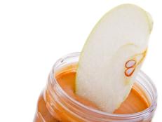Stock plenty of healthy snacks in your office so you're not tempted to hit up the snack machine when hunger pangs strike.