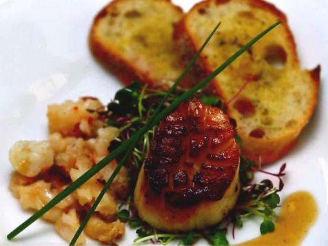 Seared Scallops over Micro Greens with Orange Tarragon Vinaigrette with Butter Poached Lobster