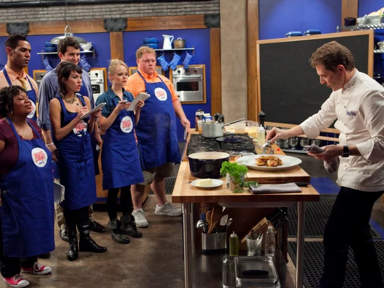 Chef Bobby Flay demonstrates to the Blue Team how to break down a whole chicken and make his Chicken Chasseur (Hunter-style Chicken) with Creamy Polenta with Gruyere and Parmesan, as seen on Food Networks Worst Cooks in America, Season 4