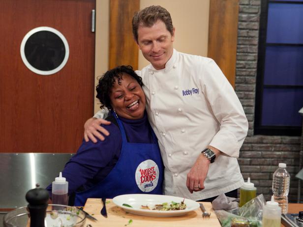 Carla Johnson reacting to Chef Bobby Flay's approval of her attempt to recreate the Chefs Crispy Skin Sea Bass with Avacado, Tomatillo and Fennel relish, as seen on Food Networks Worst Cooks in America, season 4