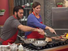 Sue Mangogna and Aadip Desai of the Red Team work on their personal take on the hamburger during the Burger Challenge , as seen on Food Networks Worst Cooks in America, season 4.
