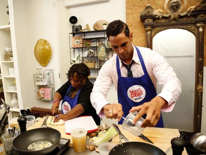Blue Team Recruits Carla Johnson and Chet Pourciau prepare Green Shrimp Lo Mein for the "Take On Take Out" challenge.  Chef Anne and Chef Bobby arrived at the recruit's house to find the recruits had been ordering take out food instead of cooking, and now they must race to replicate Chinese food recipes before the food deliveryman gets to the house, as seen on Food Network's Worst Cooks in America, Season 4.Blue Team recruit Carrie Lee Riggins prepares Green Shrimp Lo Mein for the "Take On Take Out" challenge.  Chef Anne and Chef Bobby arrived at the recruit's house to find the recruits had been ordering take out food instead of cooking, and now they must race to replicate Chinese food recipes before the food deliveryman gets to the house, as seen on Food Network's Worst Cooks in America, Season 4.