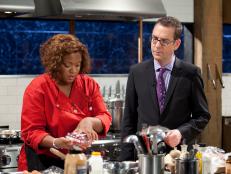 Host Ted Allen checks in with Sunny Anderson, as seen on Food Network’s Chopped All Stars, Season 14.
