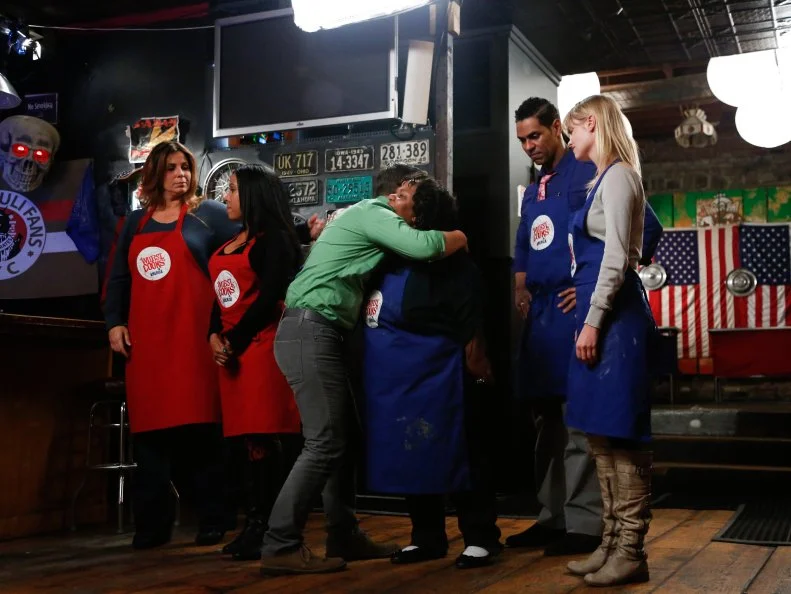 Red Team Recruit Michael Haydin is eliminated and turns in his apron after the "Biker Bites" Challenge, as seen on Food Network's Worst Cooks in America, Season 4.