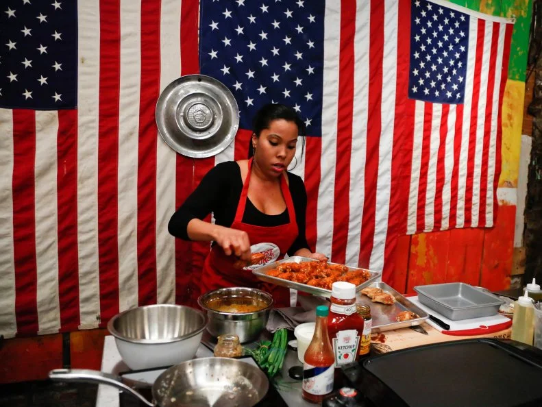 Red Team Recruit Rasheeda Brown prepares "Baby Goat Back"  chicken wings flavored with molasses, ketchup, crushed red peppers, mustard, butter, garlic, hot sauce, rosemary, salt and pepper and her second appetizer: Honeycrisp Apple, cheddar, Bacon and Bitter Green Sandwiches. The recruits must prepare a variation of Chef Annes Honey-Rosemary Wings with Greek Yogurt, Lemon Garlic Dipping Sauce and an additional appetizer for a party for hungry bikers- a tough crowd to please, as seen on Food Network's Worst Cooks in America, Season 4.