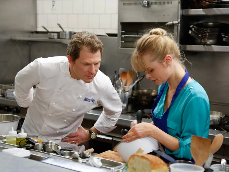 Blue Team Leader Chef Bobby Flay checks the consistancy of the Creme Anglaise Blue Team Finalist Alina Bolshakova is preparing her desert course in the finale. She is straining tasting the cream to make sure it is fresh for her creme Anglaise.  Blue Team Leader Chef Bobby Flay keeps a close eye on her and keeps her on track.  Chef Bobby is not allowed to touch the food.  He can give directions, but Alina must prepare this sophisticated meal on her own.  
Alina's Menu:
Appetizer -Lobster Scampi over Creamy Polenta with Garlic Chips
Main Dish -
Spice Rubbed Pork Tenderloin with Roasted Brussels Sprouts, Jalapeno Pesto and Pomegranates
Dessert -
Granny Smith Apples and Ginger Bread Pudding with Vanilla Bean Creme Anglaise
The recruits must prepare a three course restaurant-quality meal for a panel of distinguished culinary experts who will determine who takes home the $25,000 prize money, and the right to say they are no longer one of the worst cooks in America, as seen on Food Network's Worst Cooks in America, Season 4.