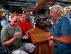 In tonight's new episode of Diners, Drive-Ins and Dives (10pm/9c) , Guy's firing up the grill and layering the flavor in Toronto and Nags Head, N.C., where he'll be diving into pork belly, a mac and cheese burger, Jamaican jerk chicken and Caribbean pork chops. The mac and cheese burger alone screams future road trip.