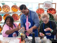 The Blue team (Carla Johnson, Elina Bolshakova and Chet Pouricau) work together while following the recipes to create the dumpling filling and dipping sauce as a team, as seen on Food Networks Worst Cooks in America, season 4.