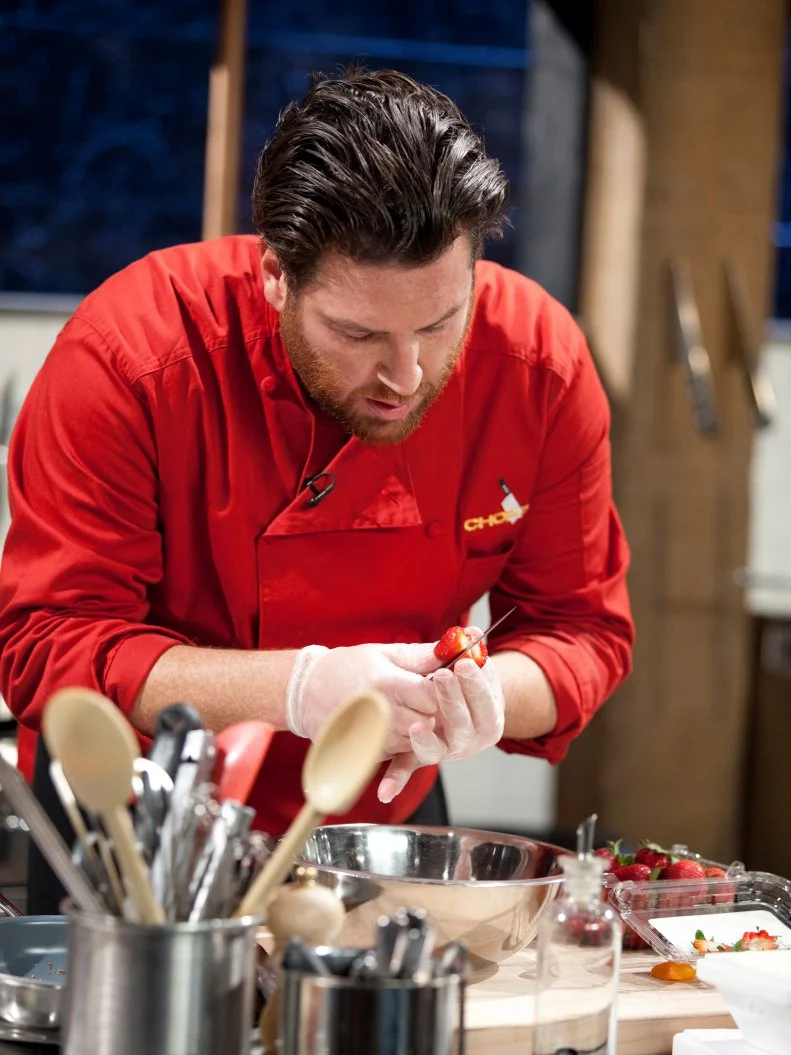 Judge and Chef Scott Conant slices strawberries, as seen on Food Network’s Chopped All Stars, Season 14.