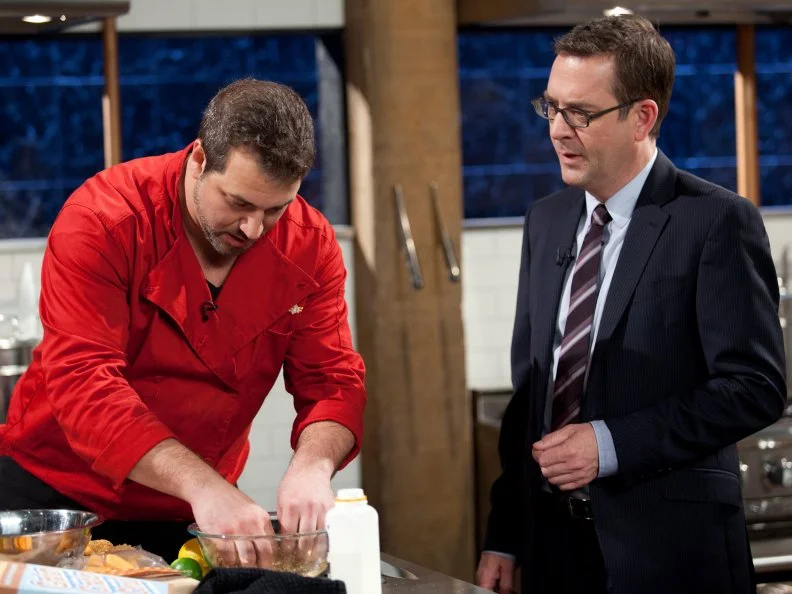 Host Ted Allen checks in with Joey Fatone, as seen on Food Network’s Chopped All Stars, Season 14.
