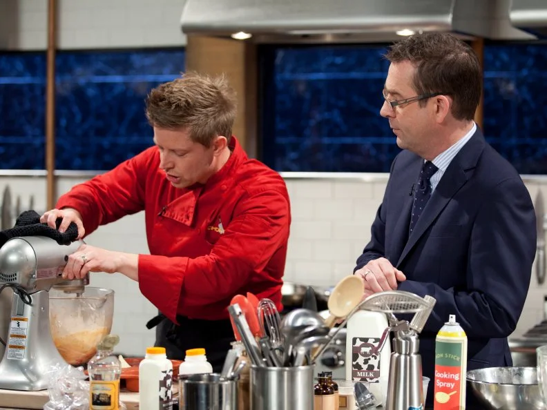 Host Ted Allen checks in with Chef Richard Blais, as seen on Food Network’s Chopped All Stars, Season 14.

