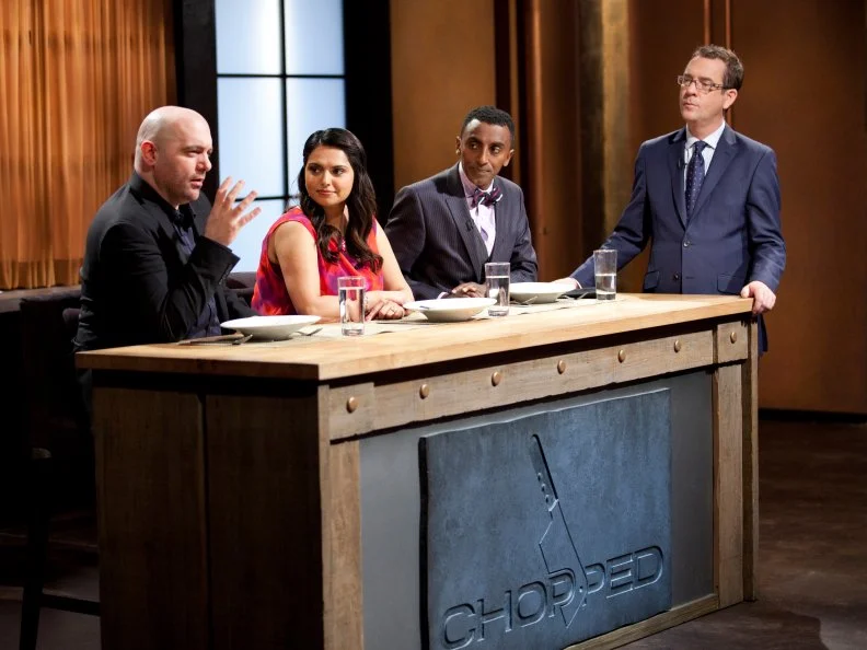 Ted Allen hosts round two of an All Star episode of Chopped and Chris Santos, Maneet Chauhan, and Marcus Samuelsson judge, as seen on Food Network’s Chopped All Stars, Season 14.
