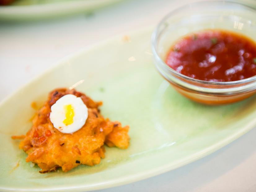 Food Network Star Finalist Chad Rosenthal's entree for the Star Challenge "Impressing the Network and FN Fans": Please don't tell my rabbi modern eggs benedict with potato latke, BBQ pork chorizo and egg, topped with sweet potato BBQ sauce as seen on Food Network Star, Season 9.
