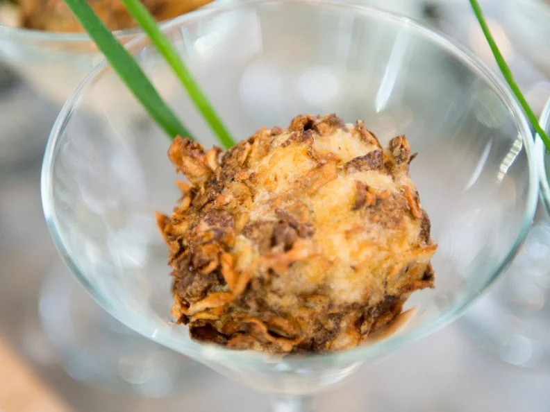 Food Network Star Finalist Stacey Poon Kinney's entree for the Star Challenge "Impressing the Network and FN Fans": Wild Man Potato Skins with Bacon, chives, white cheddat & chipotle sour cream as seen on Food Network Star, Season 9.