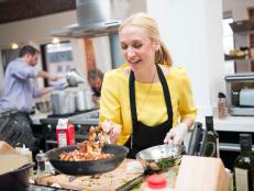 Finalist Nikki Dinki cooking for the Star Challenge "Impressing the Network and FN Fans" as seen on Food Network Star, Season 9.