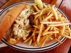 Located on the California coast, Fish is a sustainable seafood eatery that sources its fare straight from the bay. Tyler Florence loves the Dungeness crab roll. The "delicious, fresh and moist" crab is flavored with butter and chives and then placed into a sourdough roll. Tyler says it's "insane."