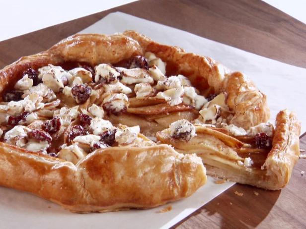 https://food.fnr.sndimg.com/content/dam/images/food/fullset/2013/6/19/0/GH0517H_apple-galette-with-goat-cheese-sour-cherry-and-almond-topping-recipe_s4x3.jpg.rend.hgtvcom.616.462.suffix/1375577667993.jpeg